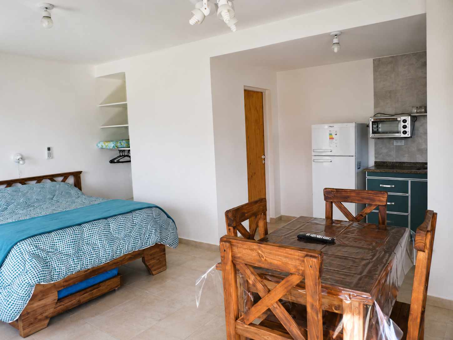 Studio apartment with kitchen and dining area